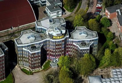 Aerial view of the unique tri-petal building at Burgerweeshuispad 101, Amsterdam.