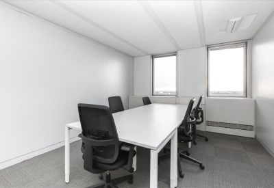 A professional six-person meeting room at Bureaux Europe, 20 Place des Halles with white desks and black mesh chairs.