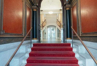 Grand marble staircase with red carpet at Colonnaden 5, Schleswig Holstein, Hamburg.