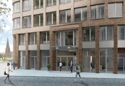 Main entrance area with glass doors and brick columns.