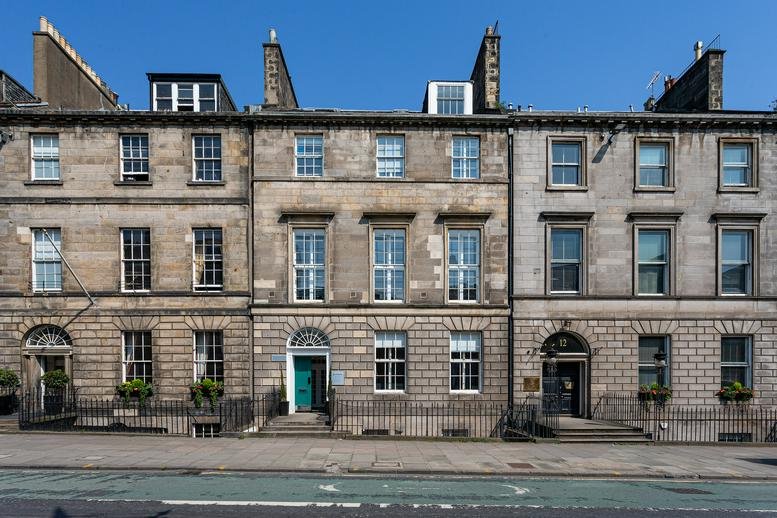 Exterior view of the classic stone facade at 10 York Place, Edinburgh, Scotland.