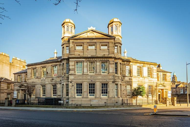 Exterior of the historic sandstone CBC House, 24 Canning Street, Edinburgh, Scotland.