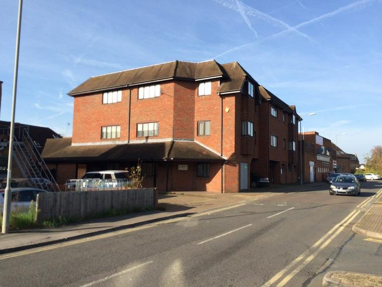 Exterior view of the brick facade of Chilterns Business Centre, Eton Place on a clear day.