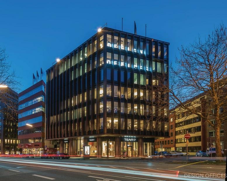 Exterior view of the dark-framed glass building at Domstraße 10, Hamburg City Centre.