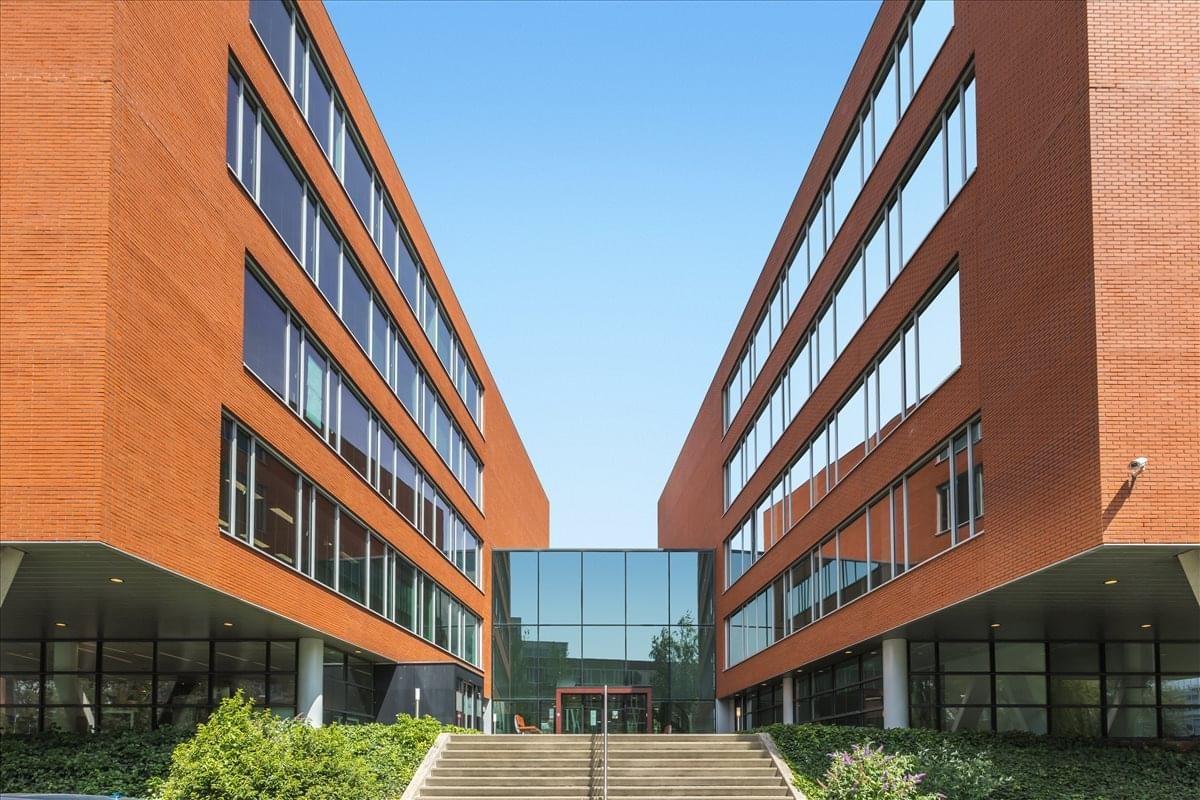 Exterior view of the modern brick and glass building at Kampenringweg 45D, Goudsepoort.