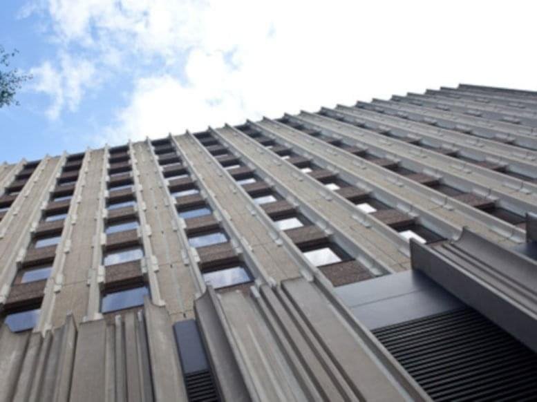 Exterior view of the concrete and glass facade at Tour Sebastopol.
