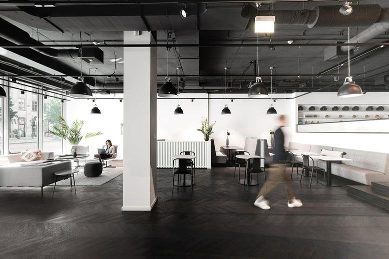 Spacious communal lounge and reception area at Stadthausbrücke 5, Hamburg, Schleswig Holstein.