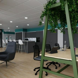 Modern coworking space with a plant-covered wooden frame over a large communal desk and teal accents.