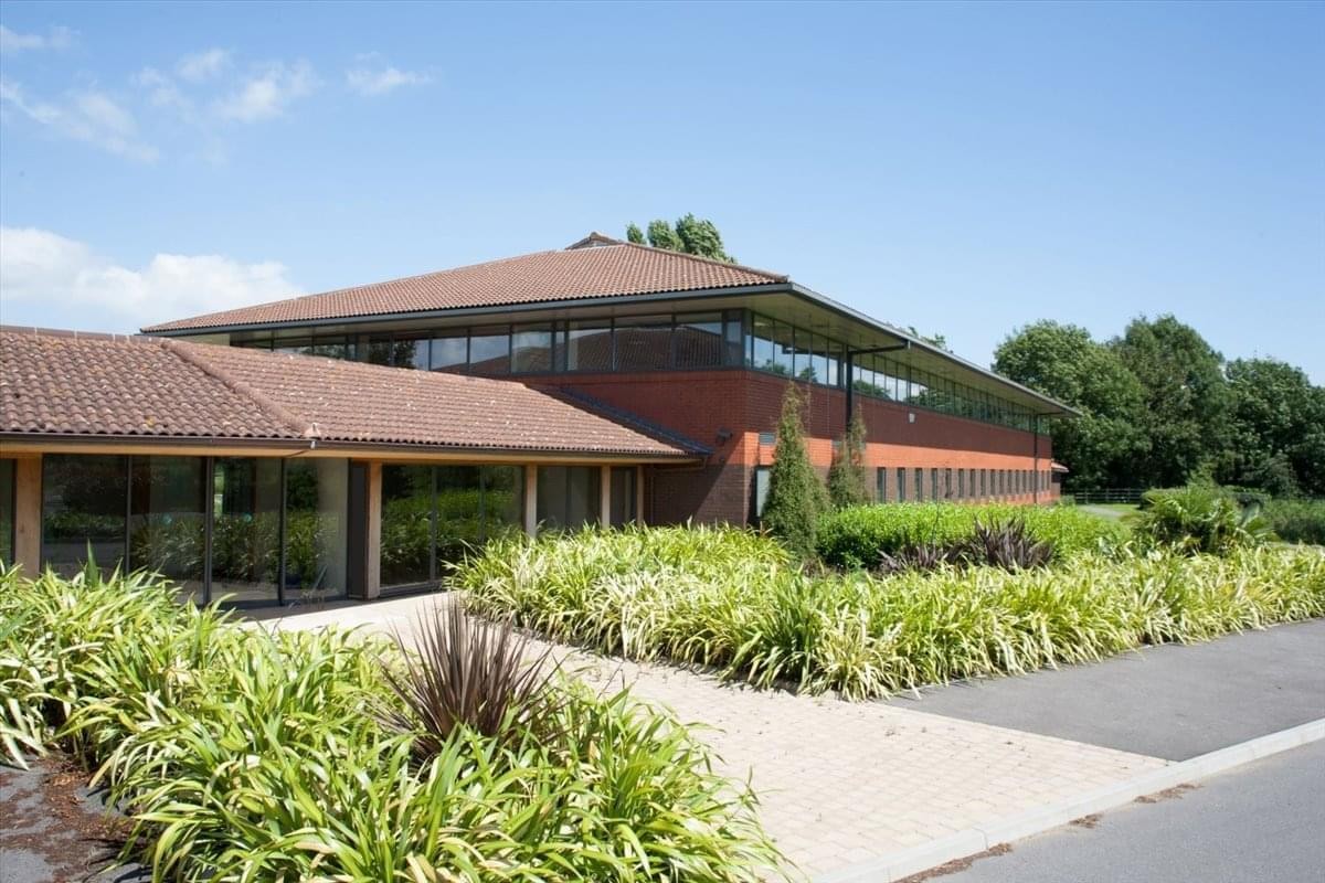 Exterior view of Baleen House, Whale Wharf Business Park, showing the brick facade and landscaped entrance.