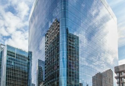 Exterior view of the contemporary glass-facade building at 2 Leman Street, London.
