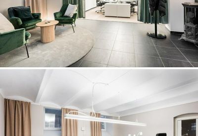 Reception area with green chairs and a round table