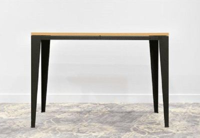 Minimalist high-top wooden desk with black metal legs.