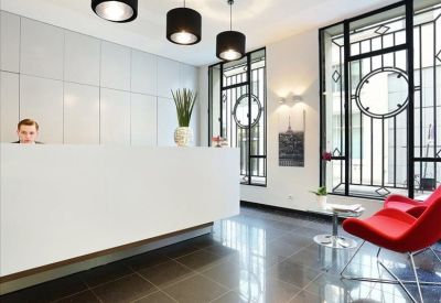 Communal area with blue chairs and modern design.