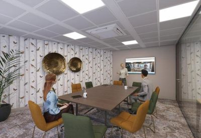 Conference room with a large wooden table and nature-themed accent wallpaper.