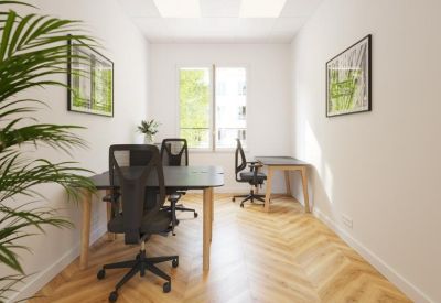 Private office suite for three people with herringbone wood floors.