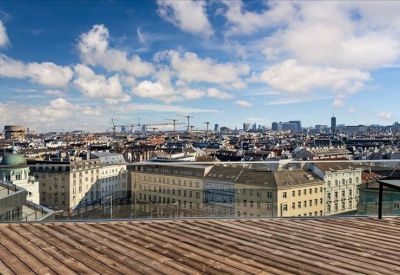 Rooftop terrace view overlooking the historic architecture of Althan, Vienna.