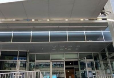 Entrance of the Lassalestraße 7b building with large SAP signage over the glass doors.