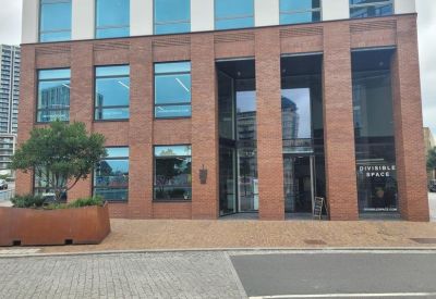 Exterior view of the modern brick facade of DivisibleSpace, 1 Sugar House Lane.