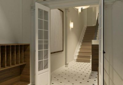 Grand reception entrance with checkered tile flooring, white arched doors, and a staircase beyond.