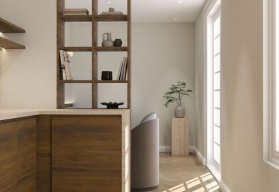Modern office workspace with dark wood cabinetry, chevron flooring, and a sleek glass partition.