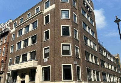 Exterior view of the brick facade and corner entrance at 12 Caxton Street.
