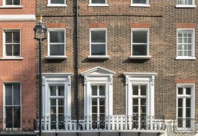 Exterior view of the historic brick facade at 124 Wigmore Street, London.