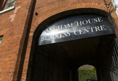 Close-up of the arched entrance signage.