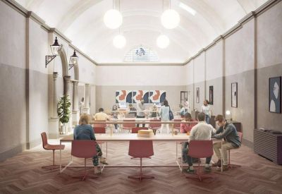 Spacious reception and waiting area with high vaulted ceilings and globe pendant lighting.