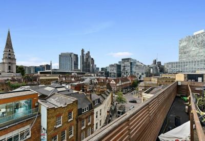 Rooftop terrace view showing the urban skyline around 17 Hanbury Street.