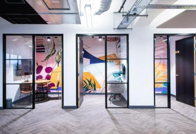 Quiet pods and private workspaces featuring colorful botanical murals.