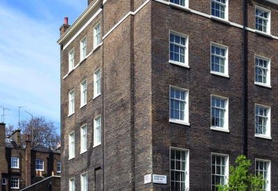 Exterior view of the classic brick facade building at 21 Gloucester Place, Central London, W1U.
