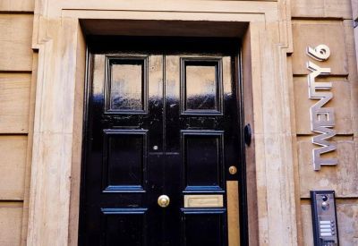 Classic stone entrance of Bank Chambers at 26 Mosley Street, Newcastle Upon Tyne.