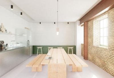 Spacious communal dining area and modern kitchen at 44-46 New Inn Yard, Central London, EC2A.