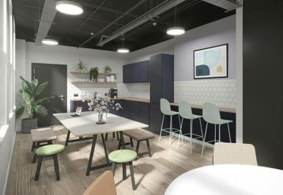 Communal kitchen with bar seating and contemporary decor.