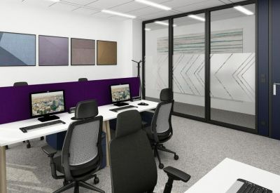 Modern office suite featuring white desks with purple privacy screens and ergonomic mesh chairs.