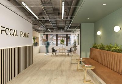 Branded reception area featuring a wood-slat wall and tan leather bench seating with plants.