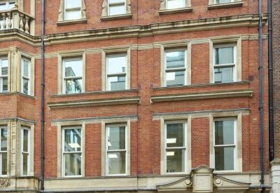 Exterior view of the classic brick facade of Green Park, 5 Bolton Street, Central London, W1J.