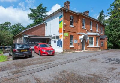 Exterior view of the brick facade and entrance at Hampshire Road, Bordon.
