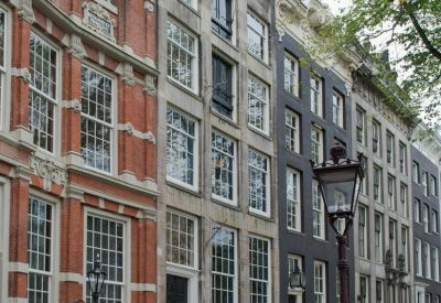 Exterior view of the historic brick and stone facade of Herengracht 168, Amsterdam, North Holland.