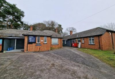 Exterior view of the brick-built office buildings on Kildare Road, Bordon, Hampshire.