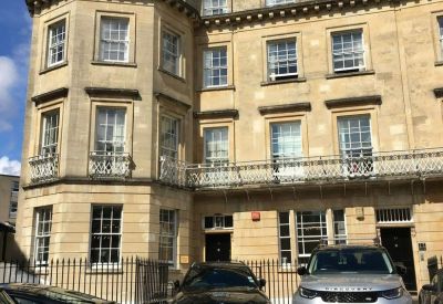 Exterior view of the historic stone facade at 10-11 Saville Place, Clifton, Bristol, Gloucestershire.