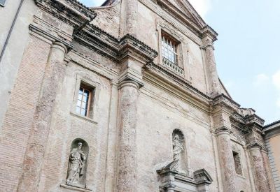 Exterior facade of Laboratorio Aperto featuring historic stone architecture and arched details.