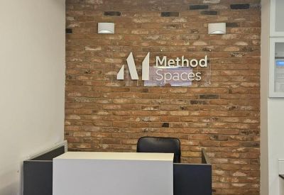 Digital coffee machine and water dispenser located in the communal kitchen area.