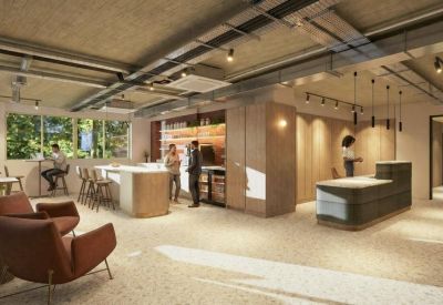 Modern reception area with a wood-panelled desk and kitchen bar.