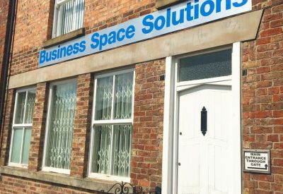 Exterior view of Business Space Solutions at 112 – 114, Market Street featuring a red brick facade.