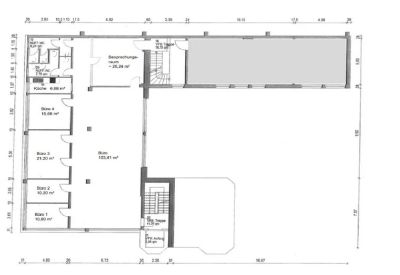 Detailed architectural floor plan showing office layouts and room dimensions.