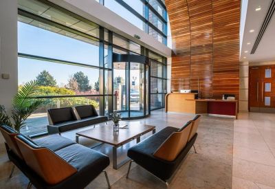 Spacious wood-paneled lobby and reception area at 2175 Century Way, Thorpe Park Business Park.