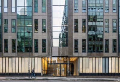 Street-level view of the main glass entrance at 24 Chiswell St.
