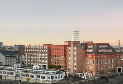 View of Clinker complex buildings with sunset sky.