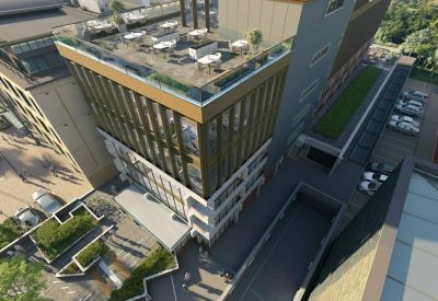 Aerial view of a rooftop terrace with outdoor seating.
